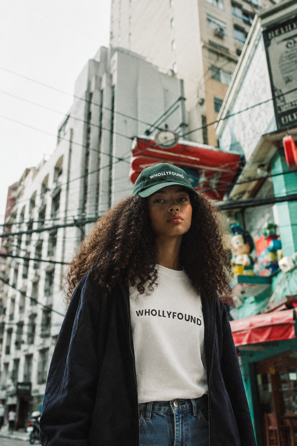 WHOLLYFOUND cap and tee in the city